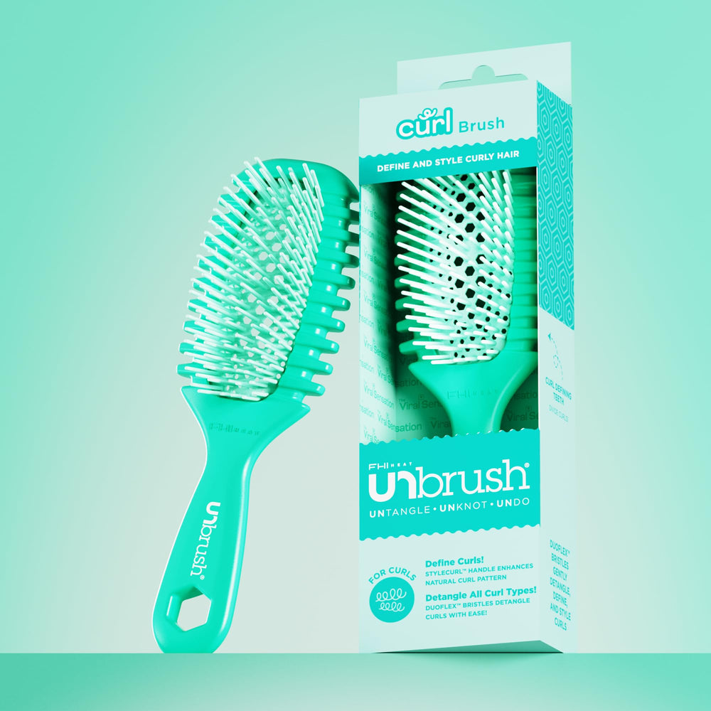 FHI Heat UNbrush Curl held in hand indicating lightweight 1.5 oz comfort