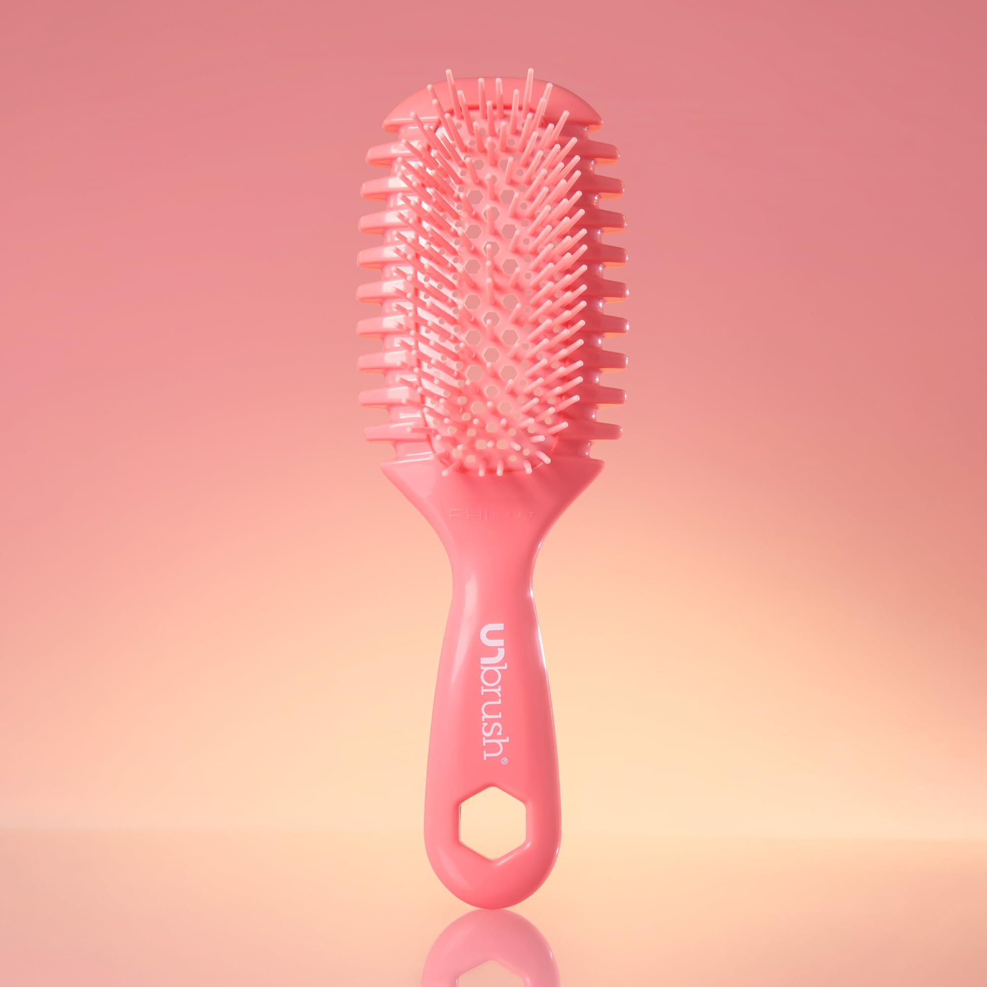 FHI Heat UNbrush Curl being used in salon for professional wet styling