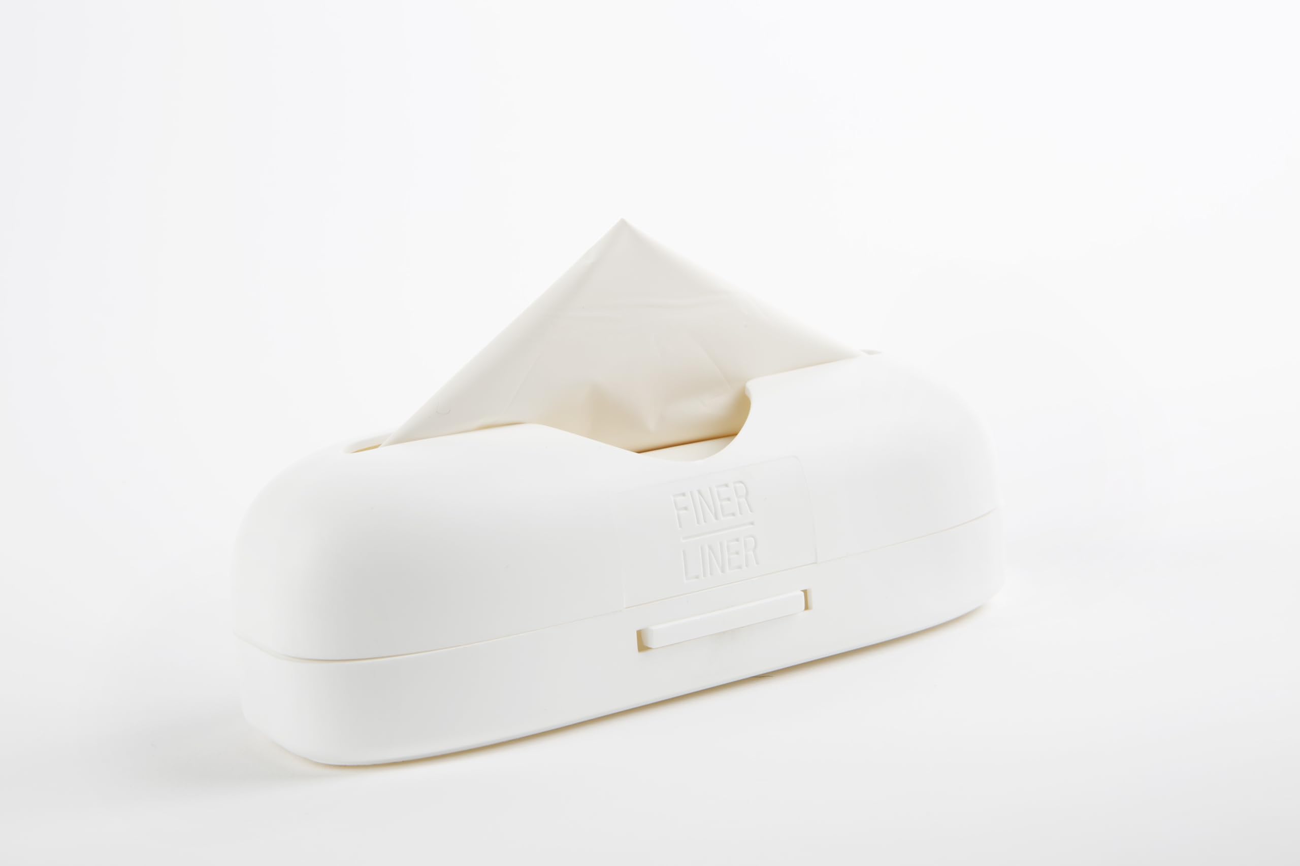 FINER LINER in a bathroom setting for discreet, unscented waste management