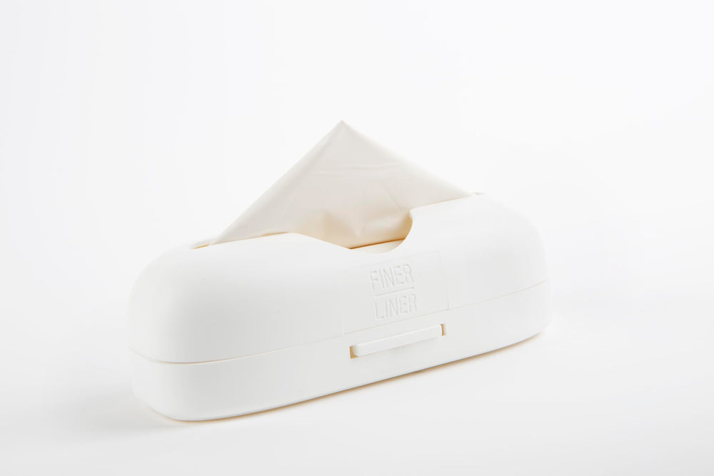 FINER LINER in a bathroom setting for discreet, unscented waste management