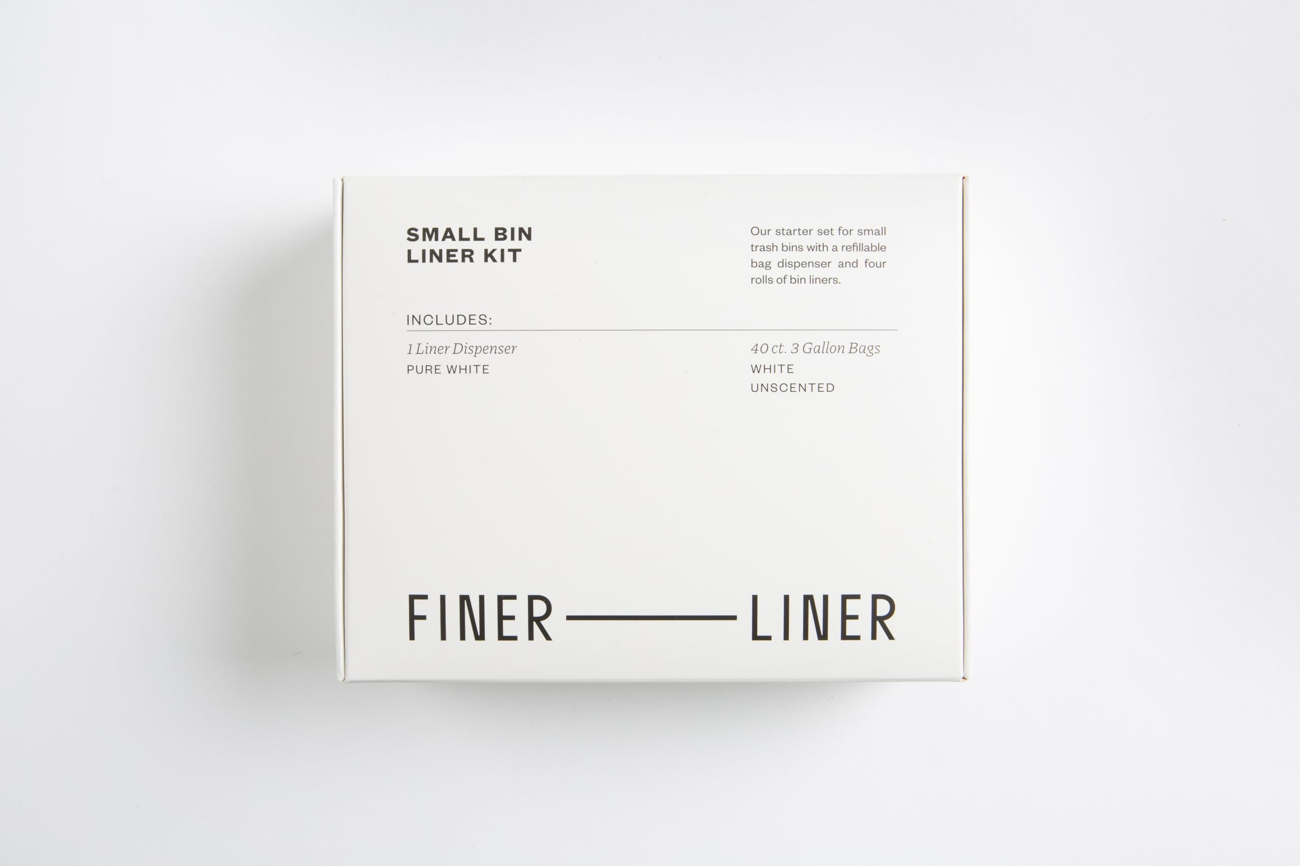 FINER LINER held in hand for scale, showing compact size and easy handling