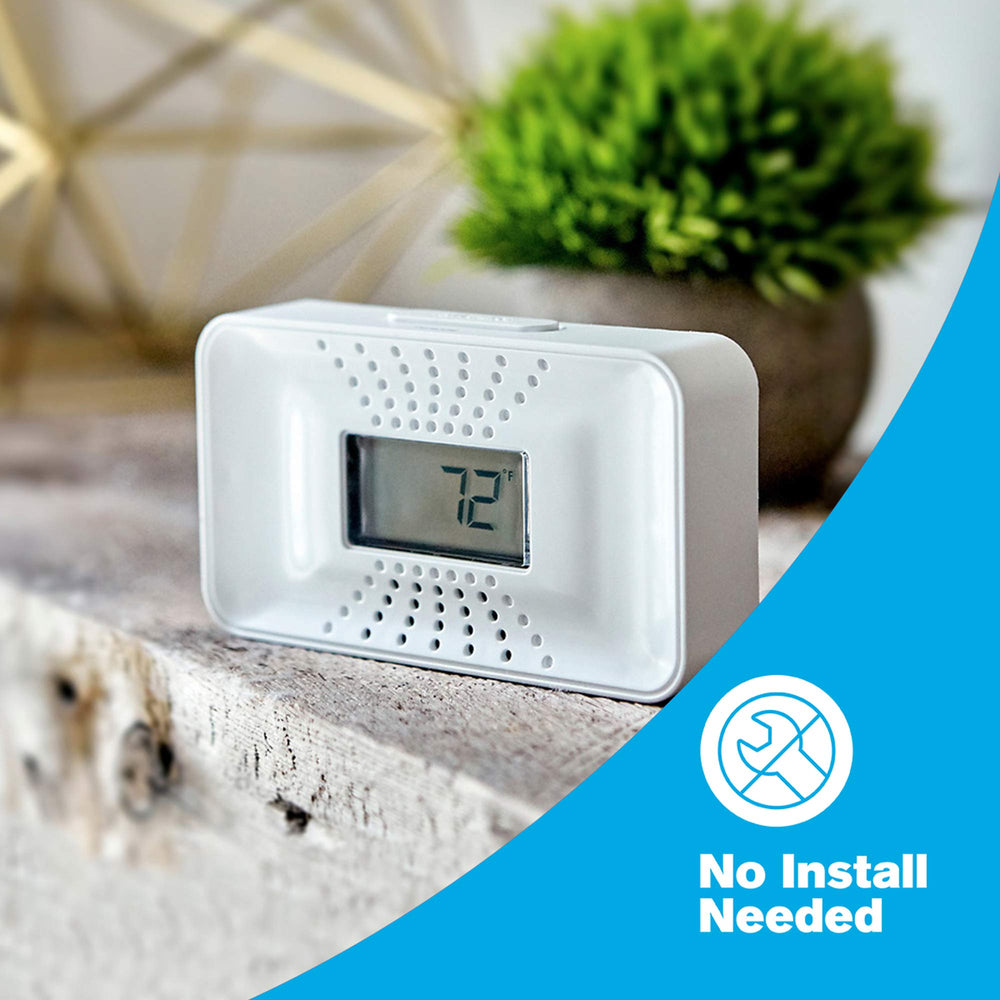 First Alert CO710 sitting on a dresser in bedroom demonstrating in-home placement benefit