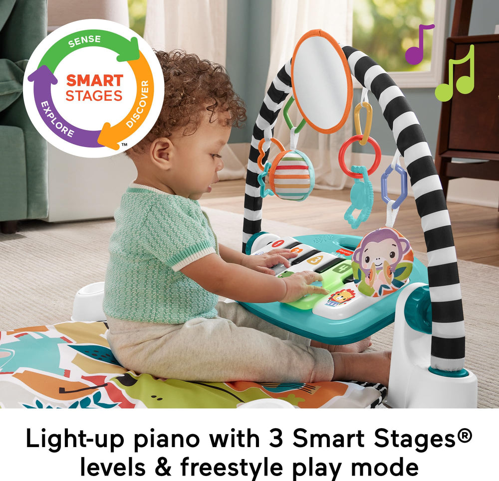 Fisher-Price baby doing tummy time on mat building strength and engagement