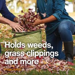 Fiskars in use collecting leaves to speed yard cleanup