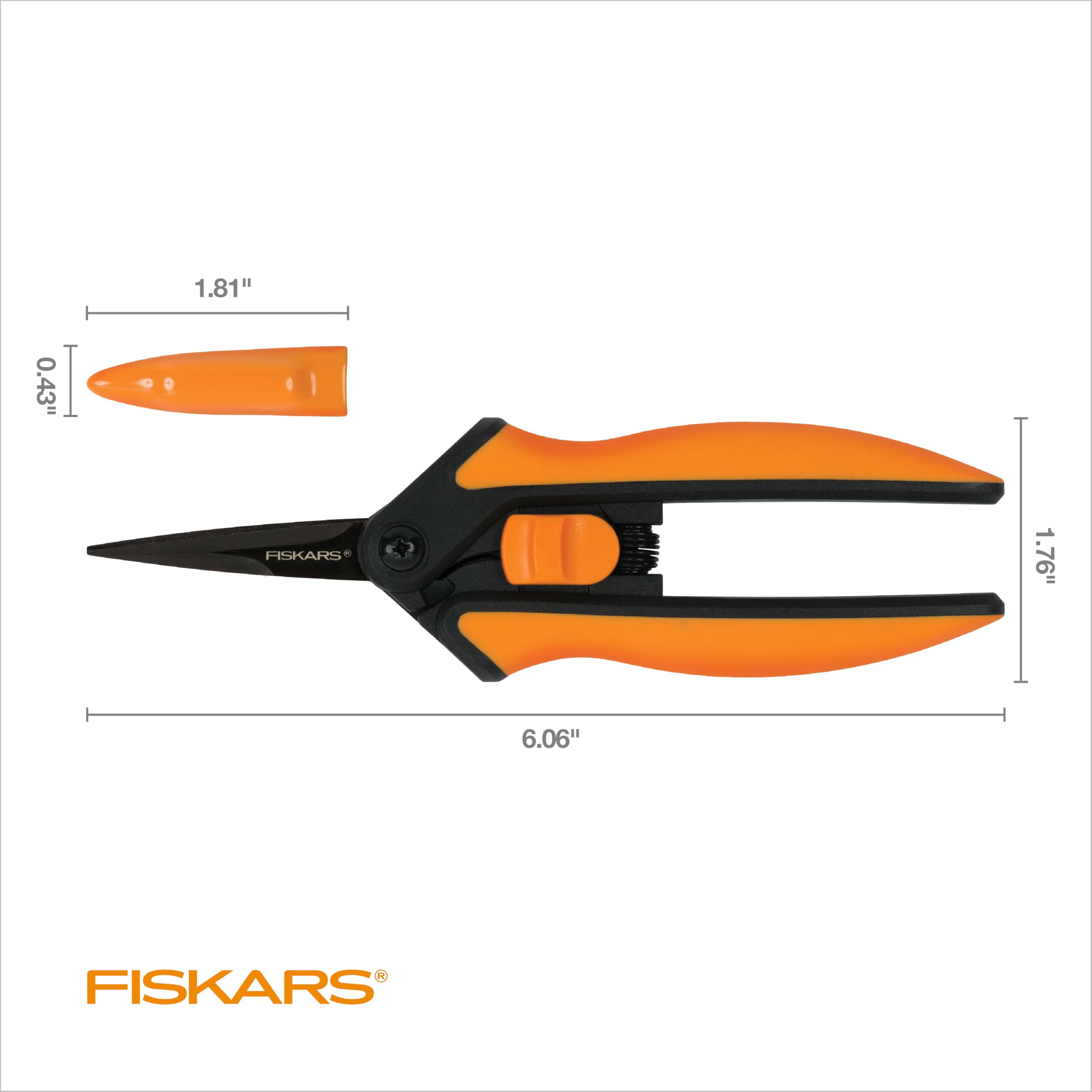 Fiskars snips cutting herbs showing compact size and scale