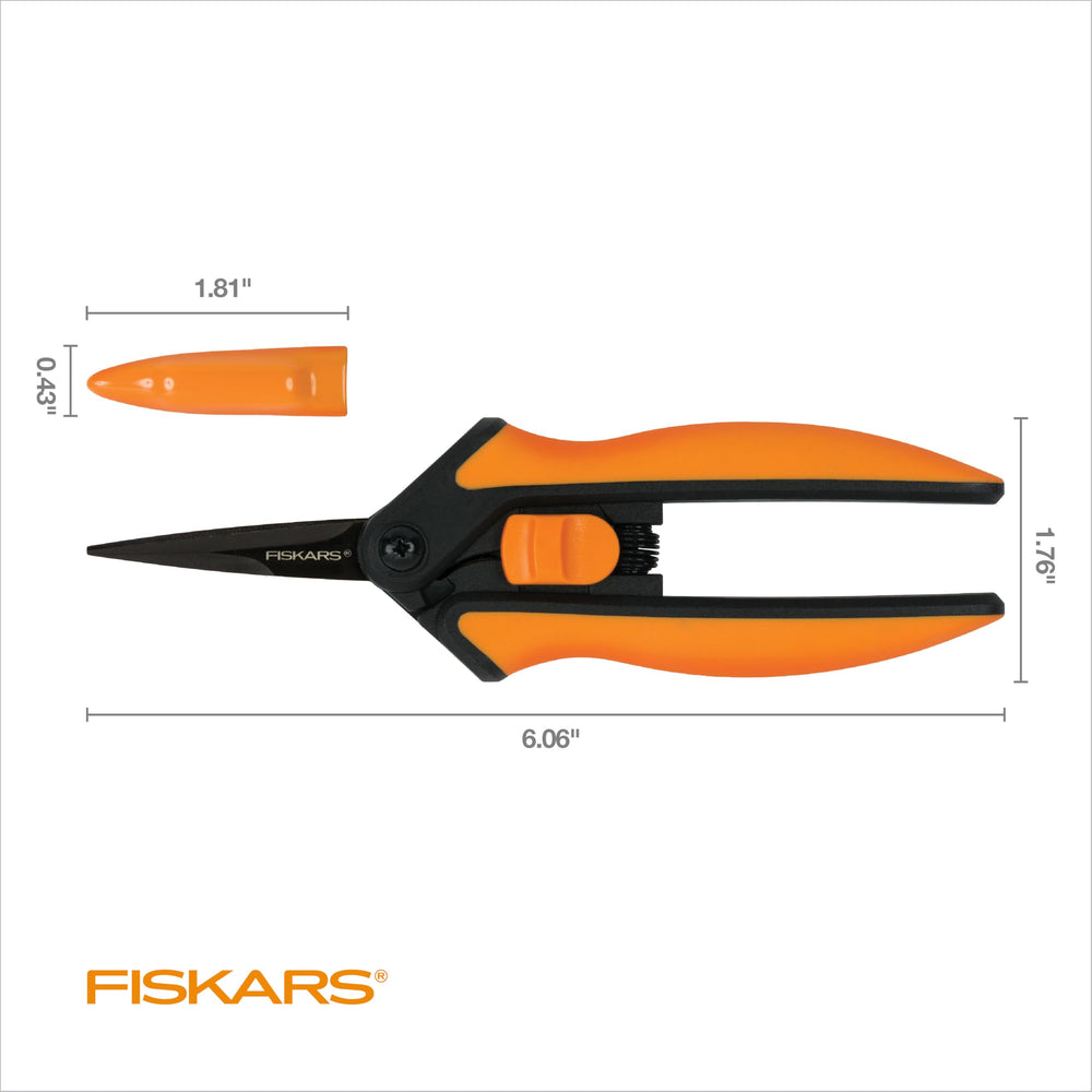 Fiskars snips cutting herbs showing compact size and scale