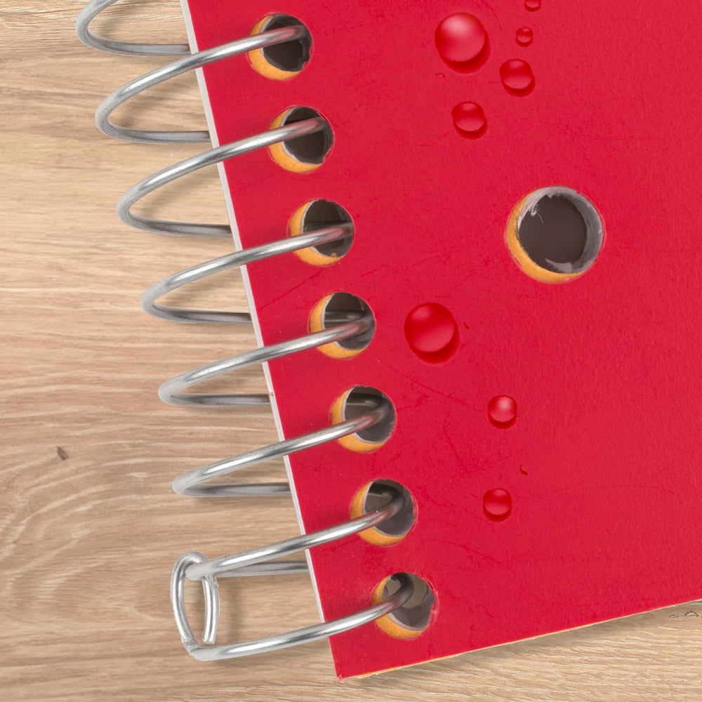 Five Star notebook beside a standard folder showing true 8.5x11 size for scale