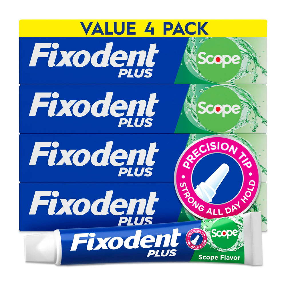 Fixodent front packaging showing four mint tubes and product benefits