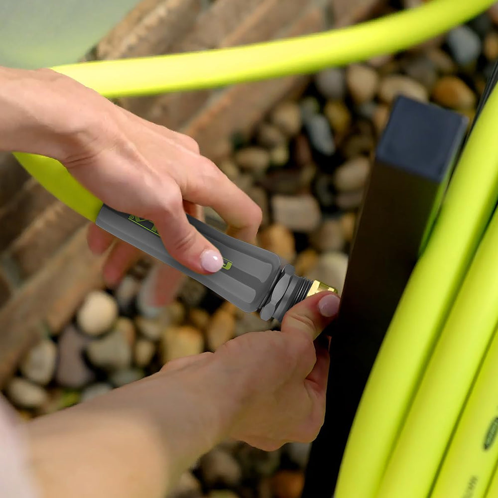 Flexzilla in a backyard being used to water plants showing portability benefit