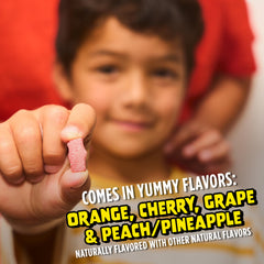 Assorted Flintstones Vitamins tablets on a hand illustrating kid-friendly sizes and flavors