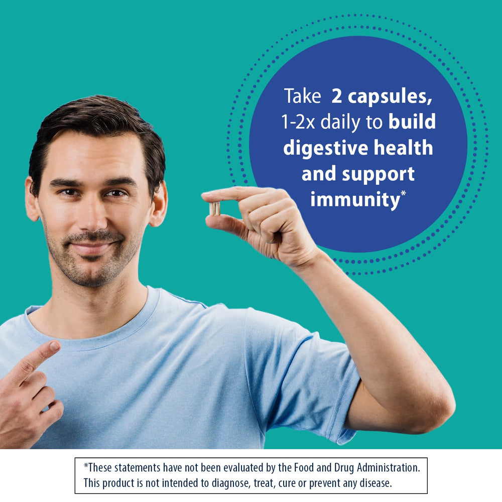 open bottle with capsules on spoon and Florastor, visual for dosage ease