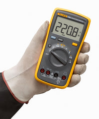 Fluke 15B+ probe connection detail illustrating secure inputs and safer testing