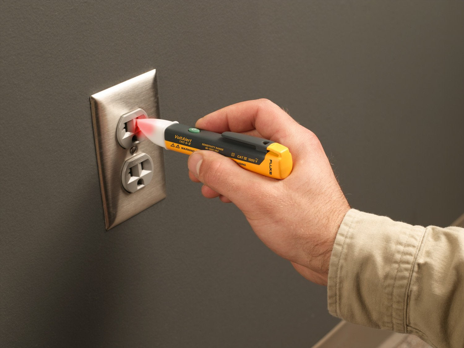 Fluke held in hand demonstrating pocket-sized convenience and portability
