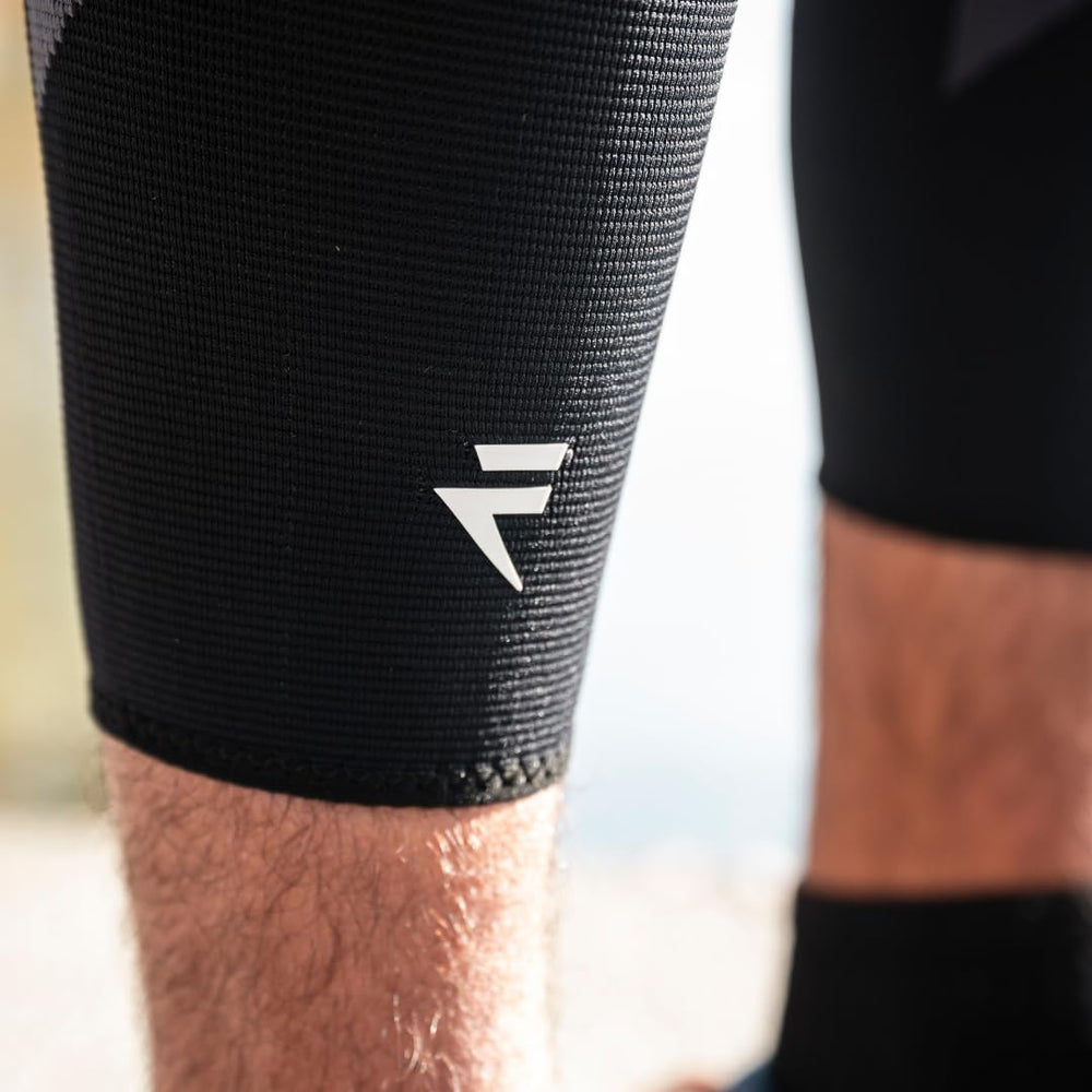 Flytex sleeve next to hand for scale showing true size and fit confidence