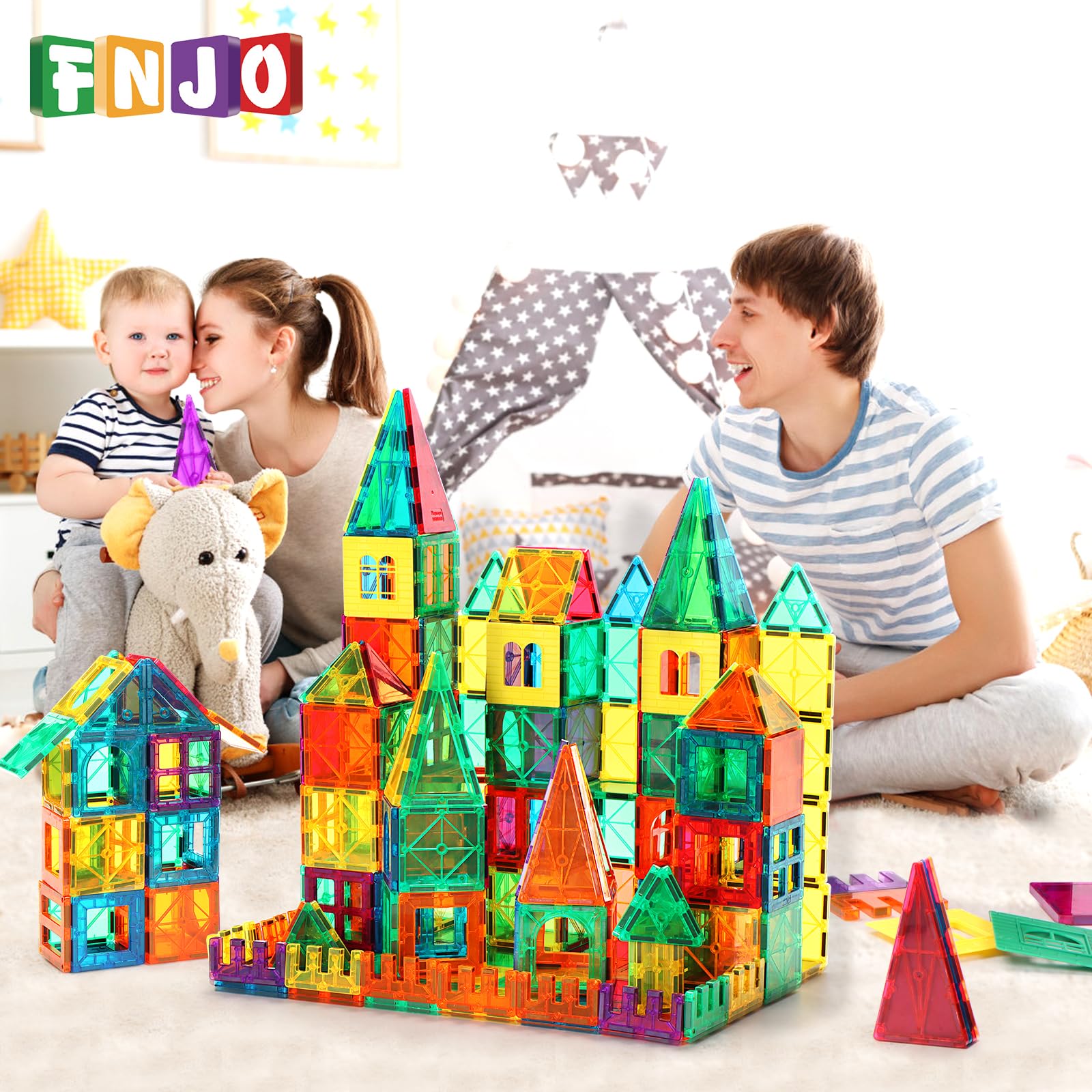 FNJO tiles beside a child’s hand to show scale and fine-motor practice