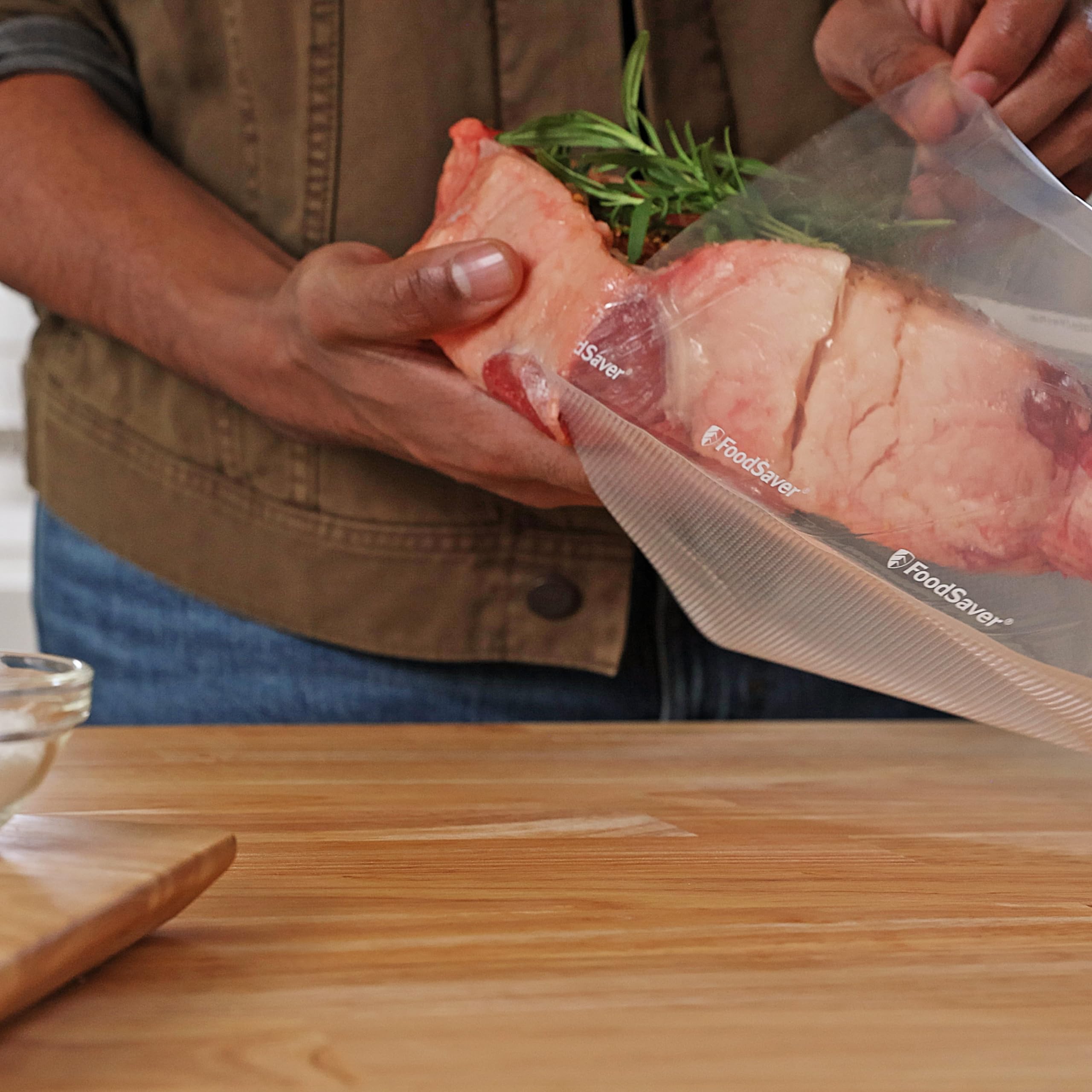 FoodSaver stacked vacuum-sealed bags in freezer showing space saving organization