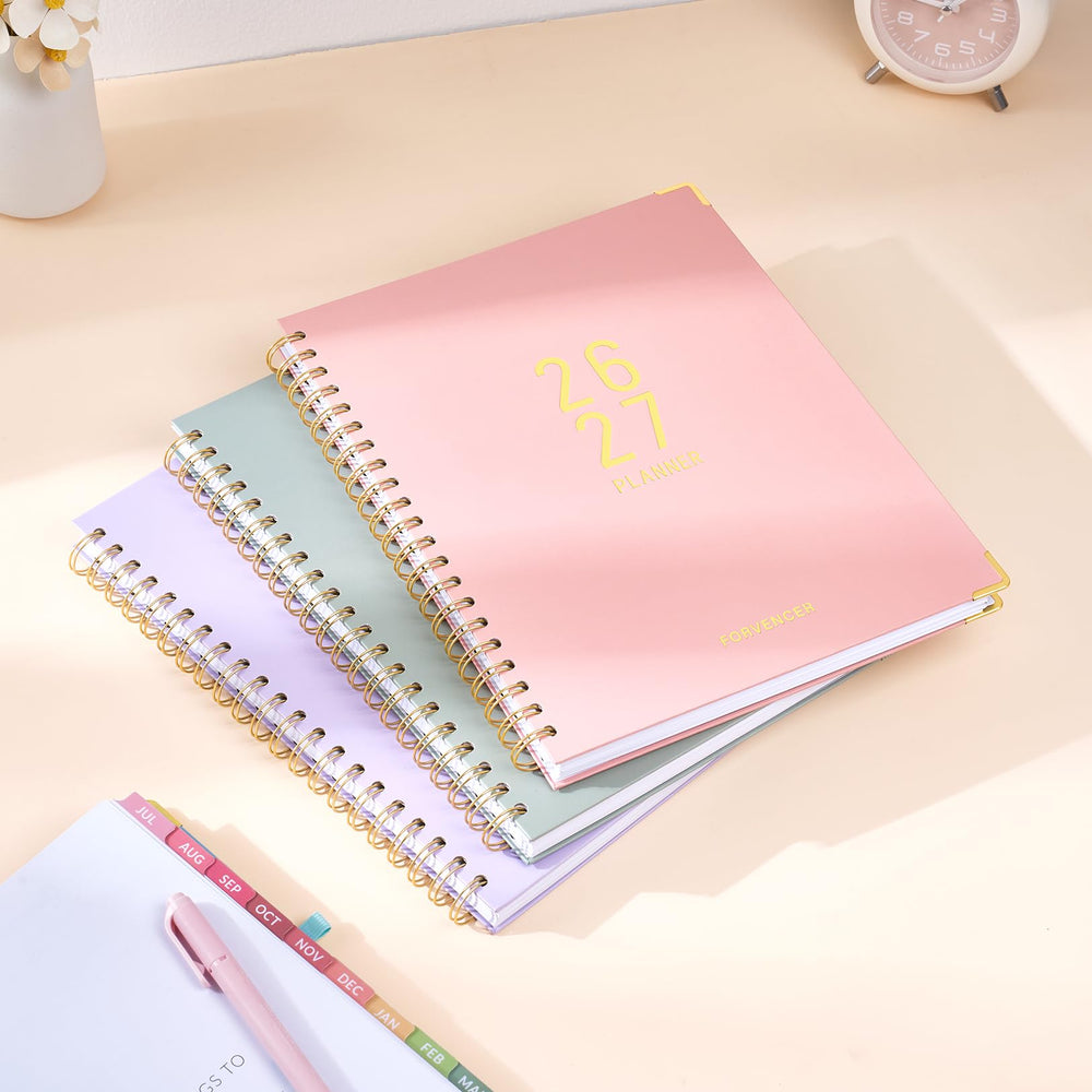 Forvencer on a tidy desk with planner in use to support daily productivity