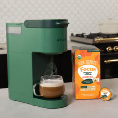 Four Sigmatic K-Cup brewing in single-serve machine for fast convenience