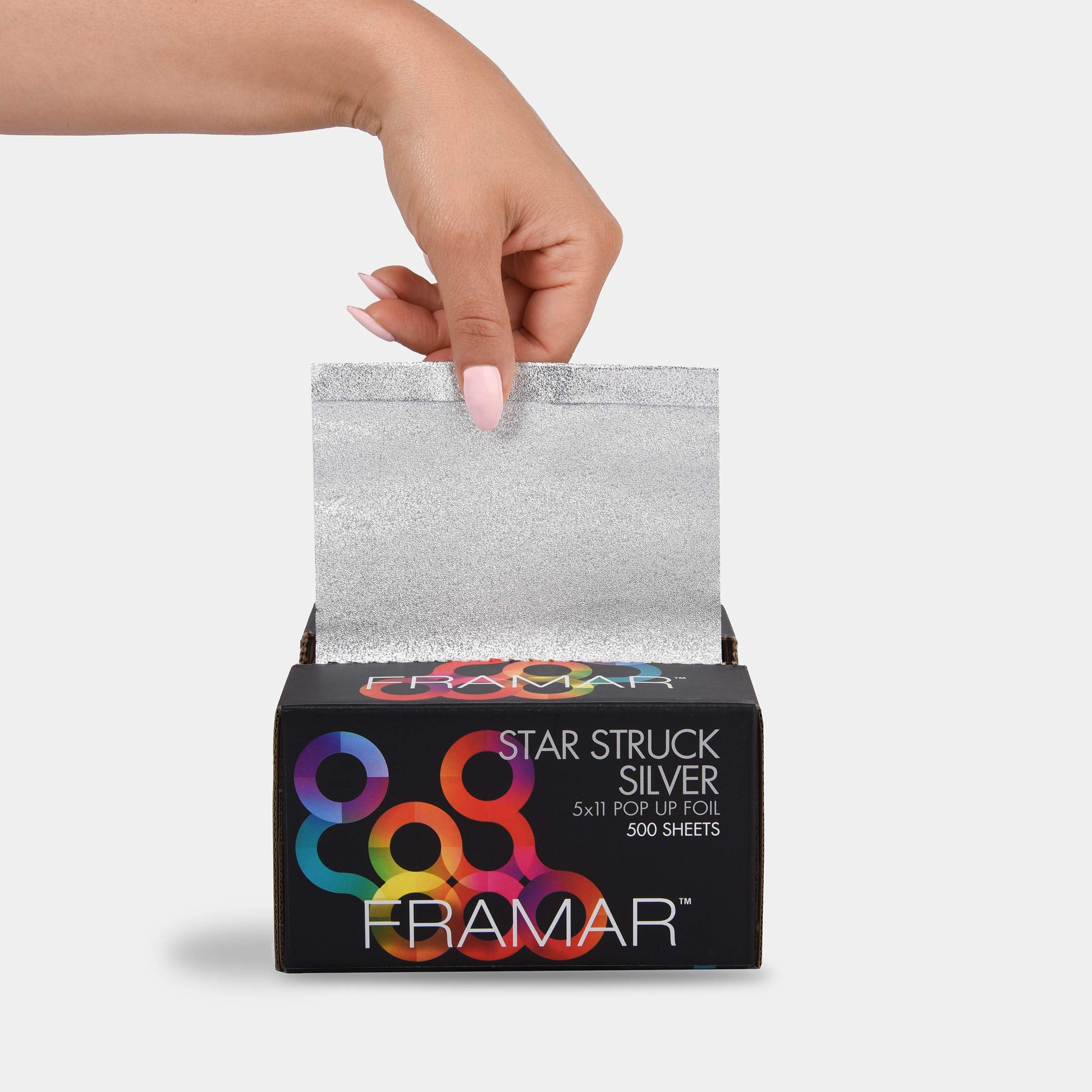 FRAMAR foil sheet on hair in use showing secure color containment benefit