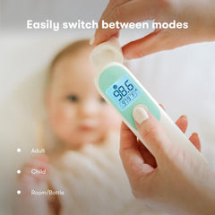 Frida Baby thermometer forehead scan on sleeping baby, gentle monitoring