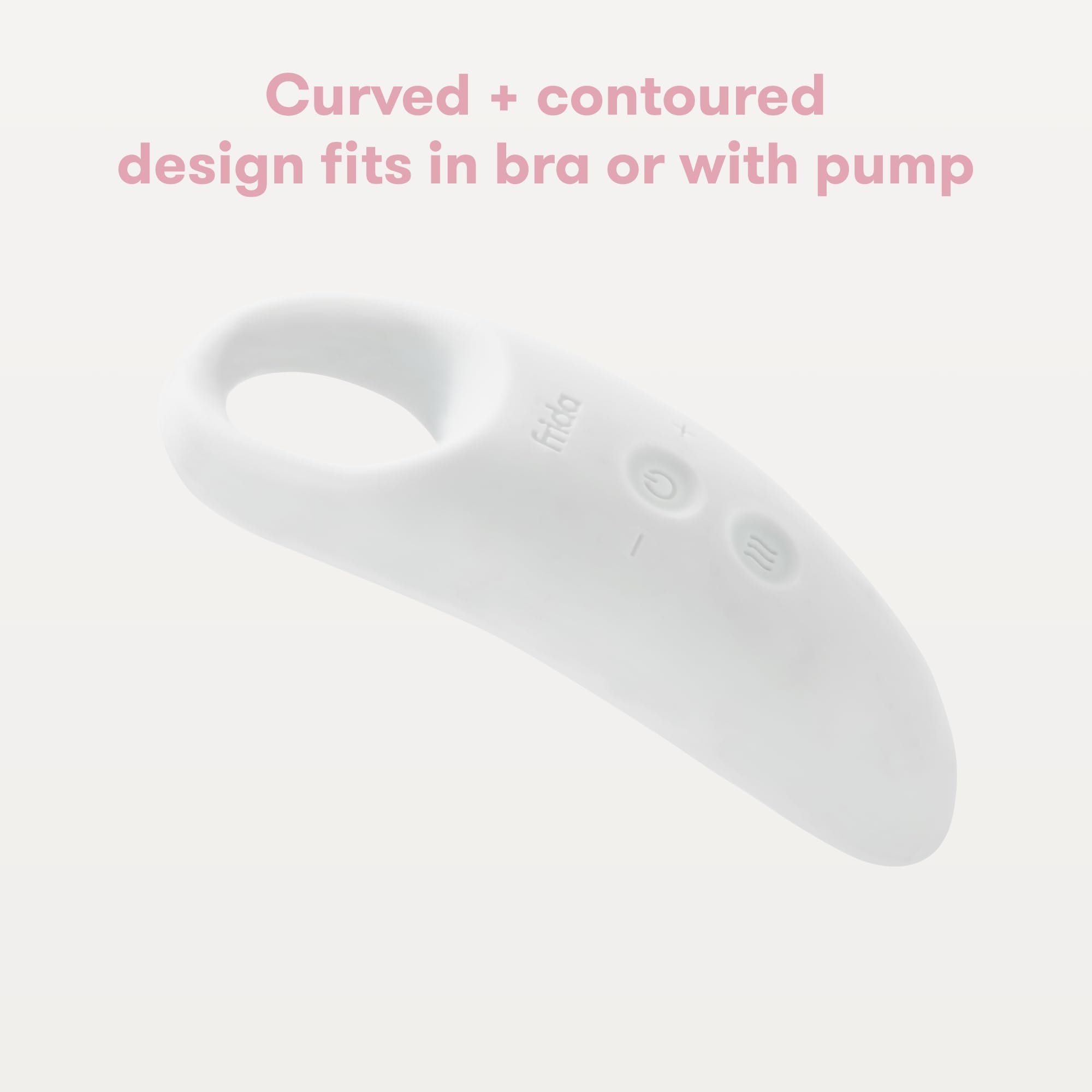 Frida Mom massager held in a hand for size comparison, portable and pocket-size for on-the-go use