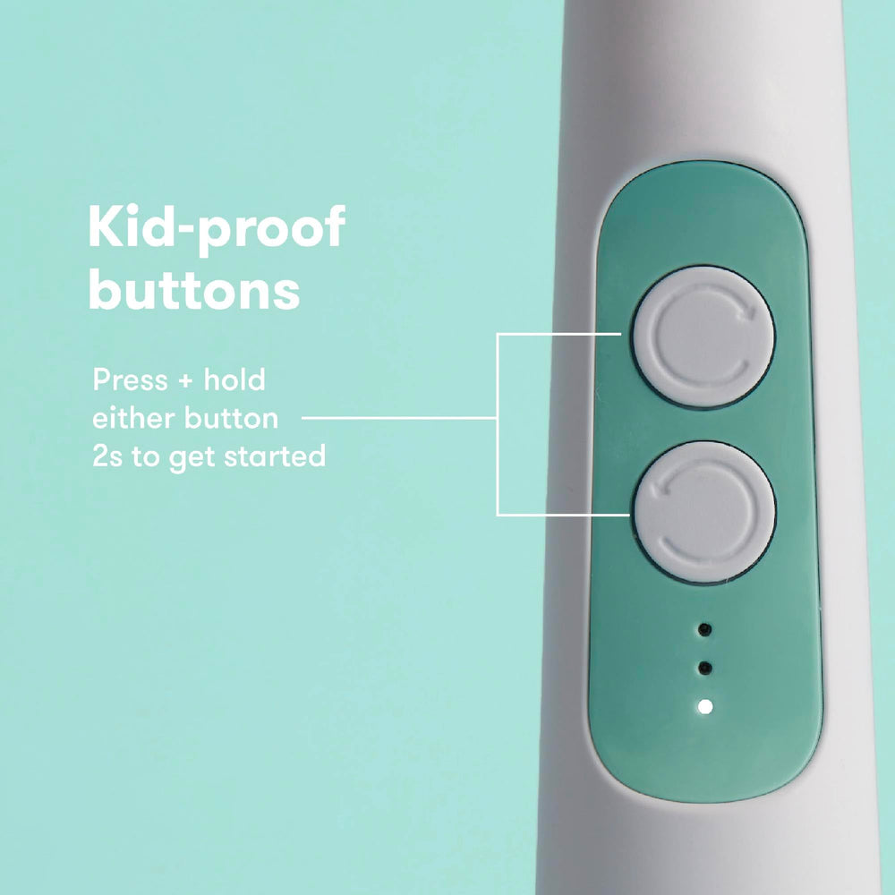 Frida buffer next to infant fingers showing compact size and safe handling benefit