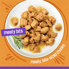 Friskies open can with gravy visible highlighting moist texture and aroma