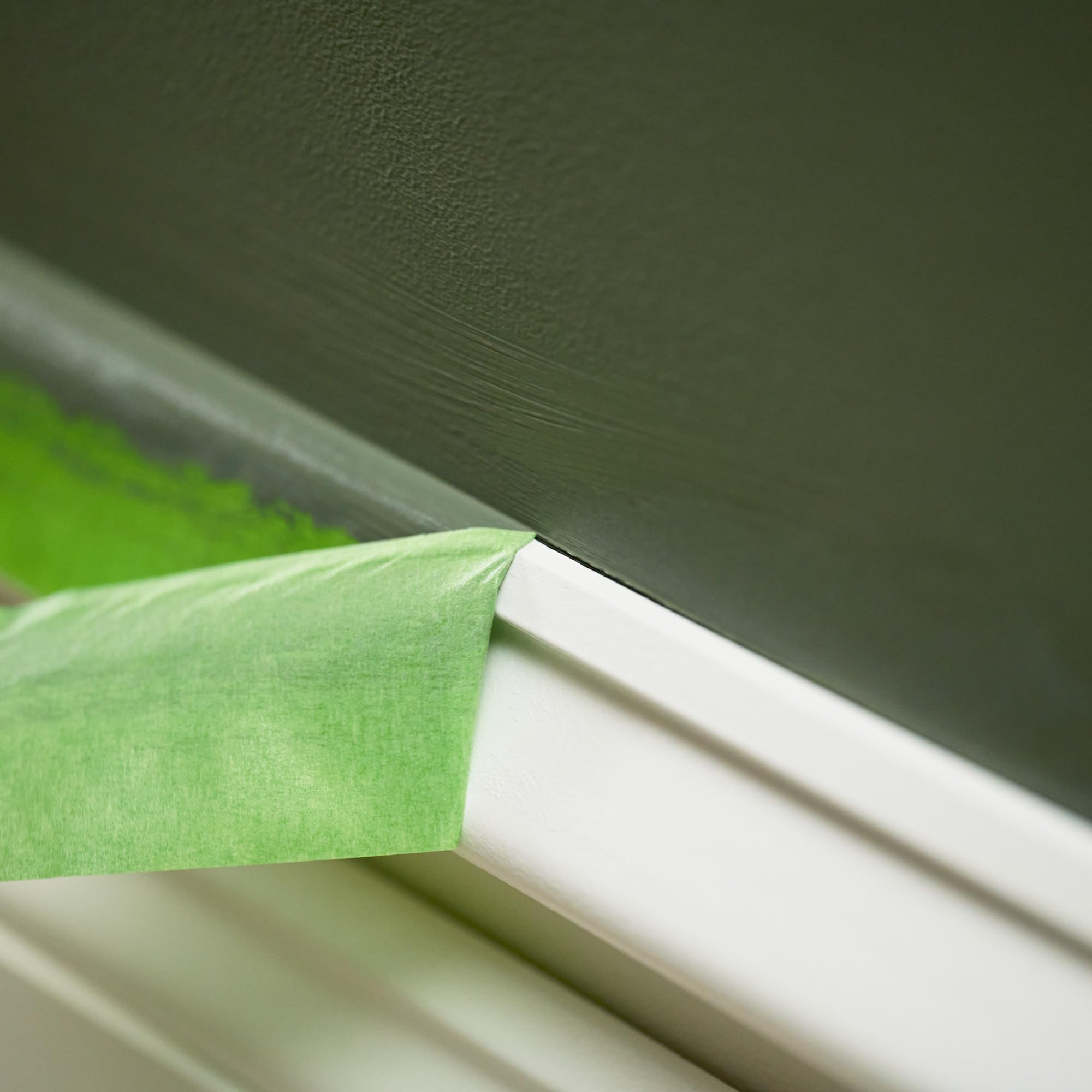 FrogTape roll beside ruler showing 1.88 inch width and 60 yard length for scale