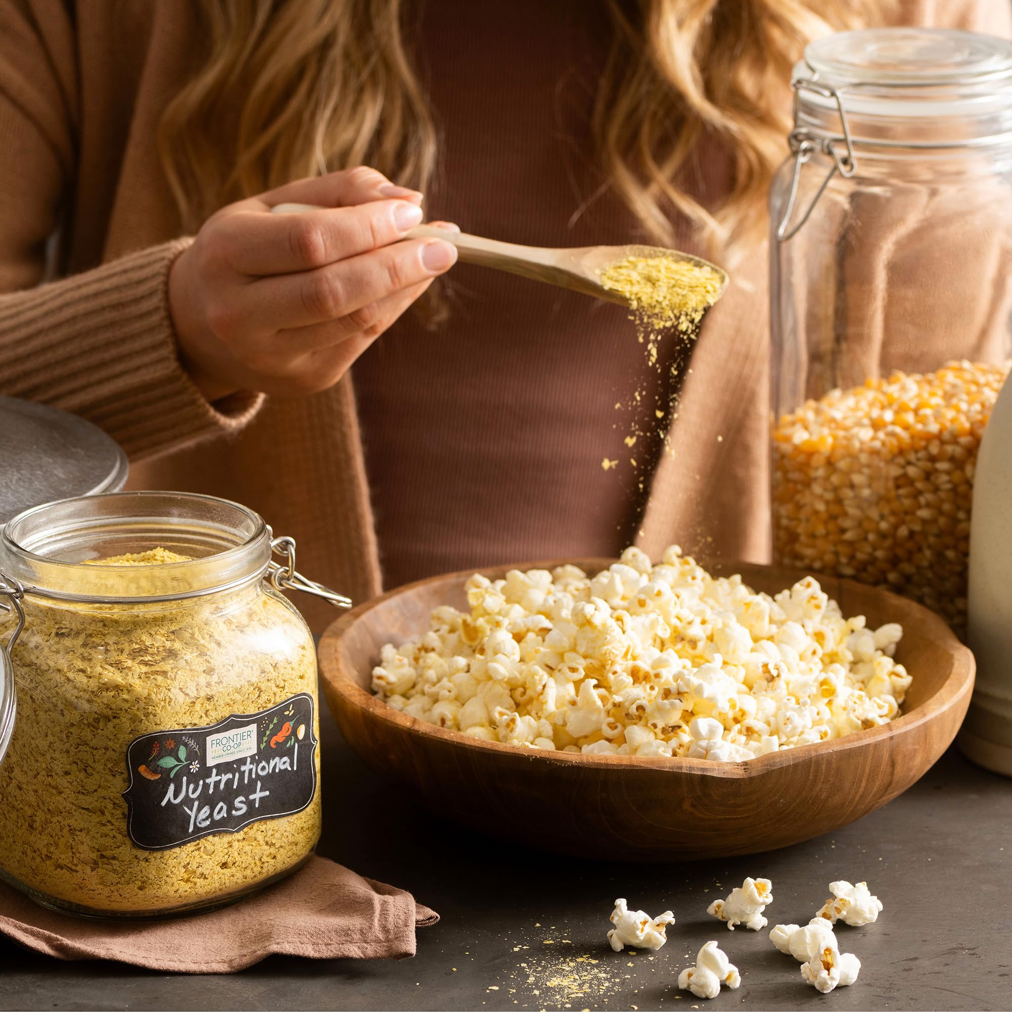 Frontier Co-op flakes dusted over pasta to enhance umami and richness