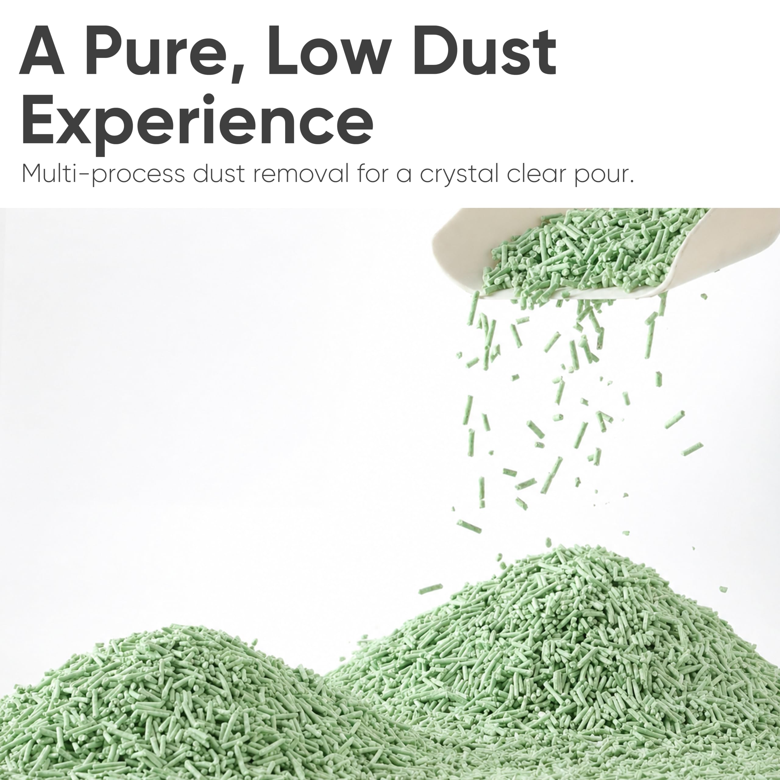 FUKUMARU clumped pellet being scooped for quick cleanup benefit