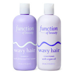 Function of Beauty front packaging of wavy shampoo and conditioner, shows cohesive set and benefits