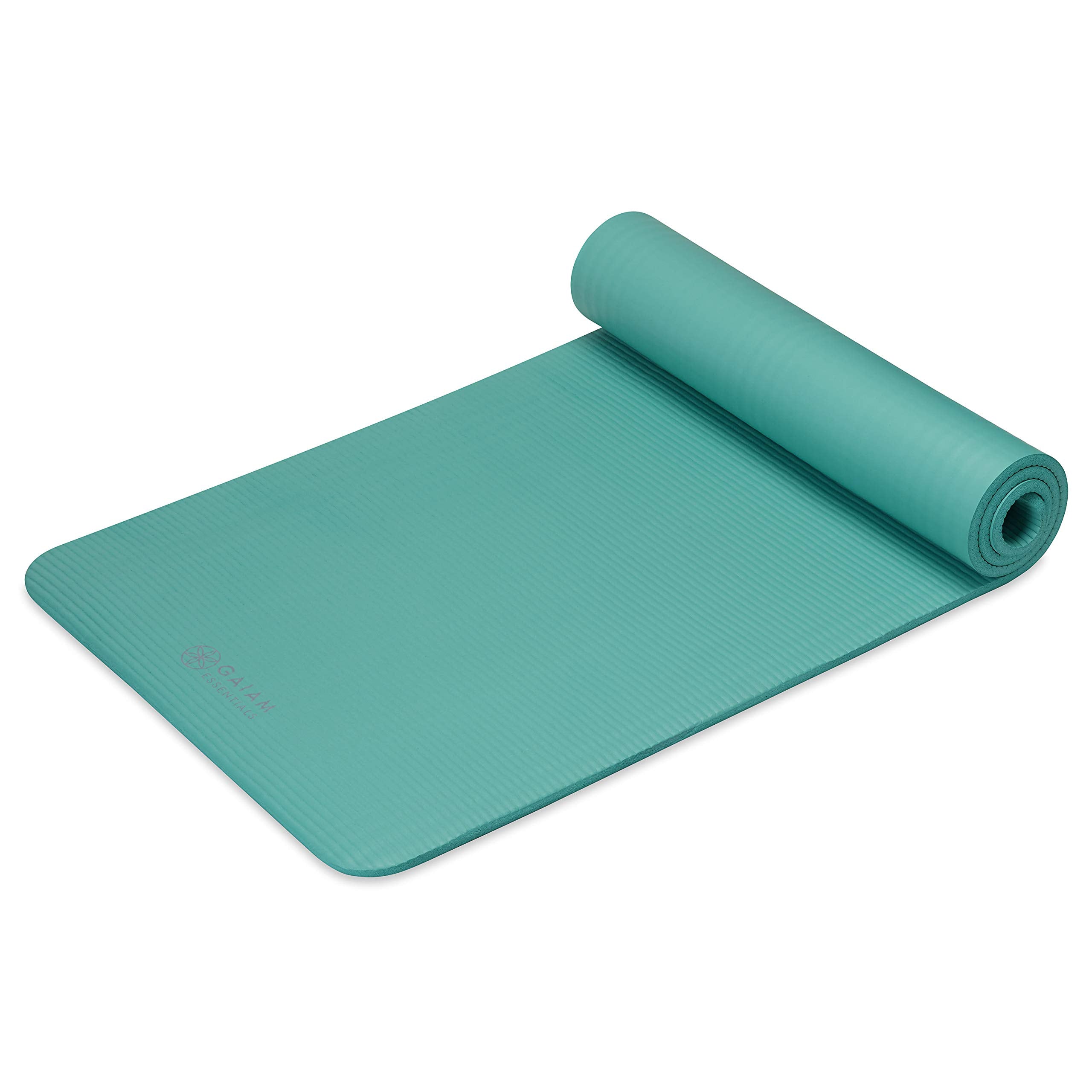 Gaiam mat next to measuring tape displaying full 72-inch length