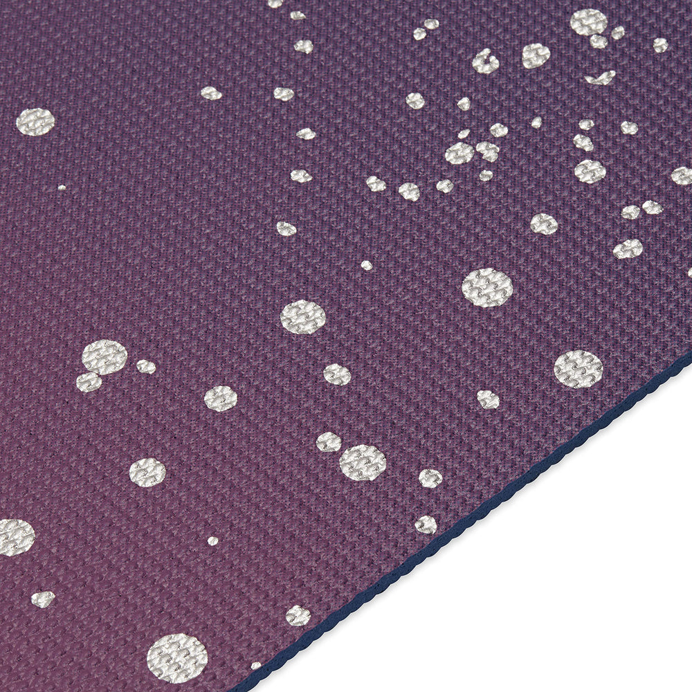 Gaiam mat in use during home practice providing stable support