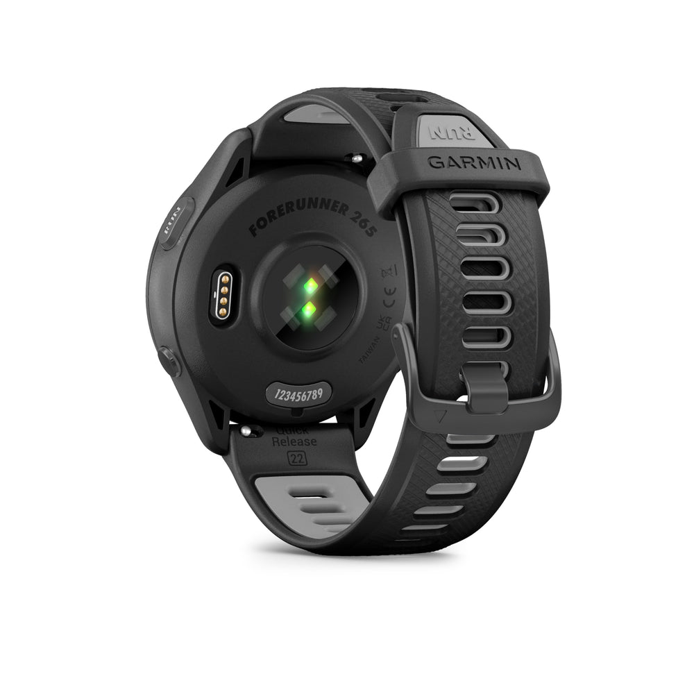 Garmin Forerunner 265 worn during outdoor run showing GPS and training metrics for on-the-go guidance benefit