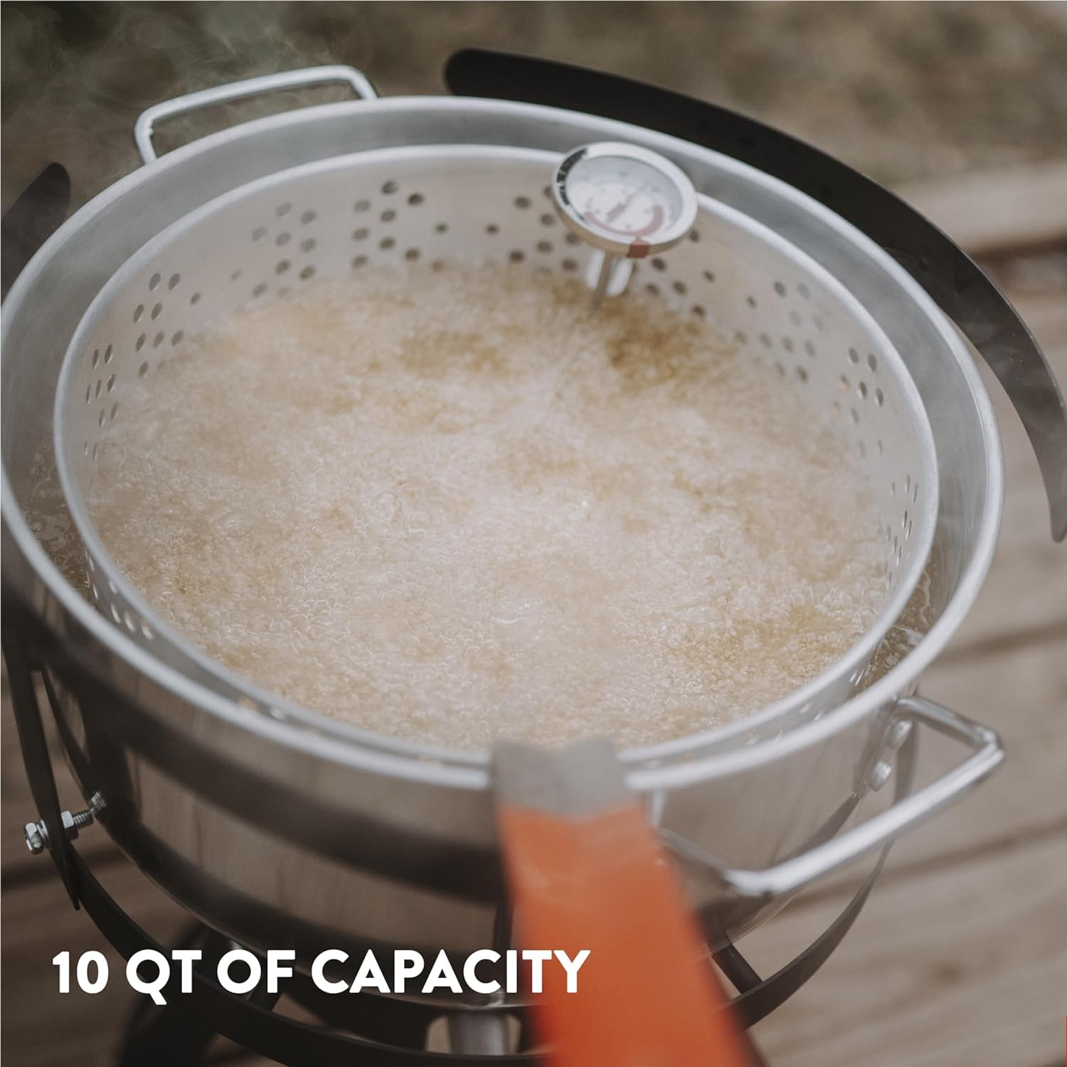 Gas One fryer with golden fried chicken showcasing batch cooking results