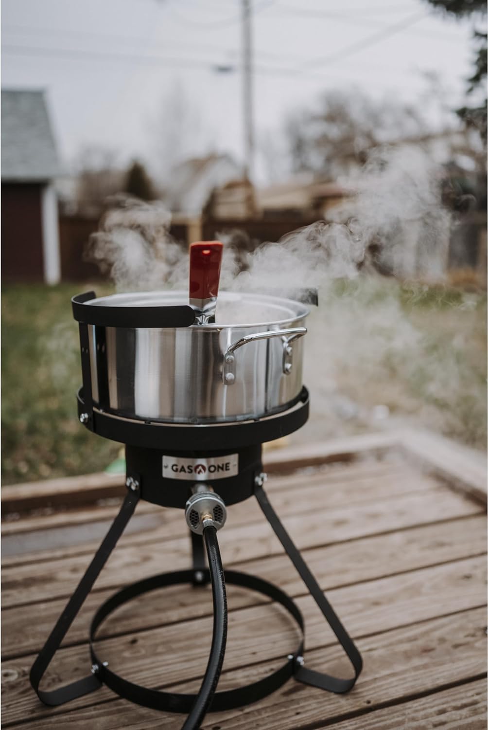 Gas One packed fryer in camping setup highlighting portability and versatility