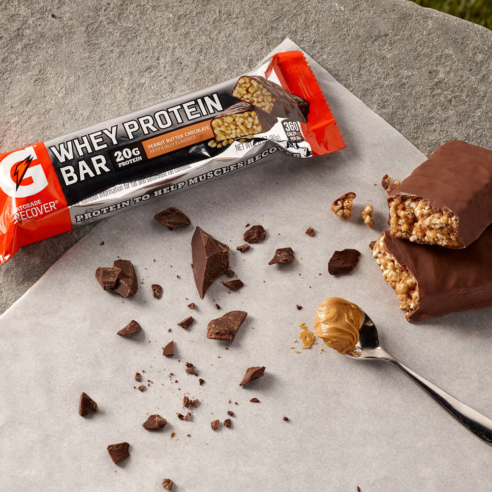 Gatorade recover bar on gym bench ready for immediate workout recovery