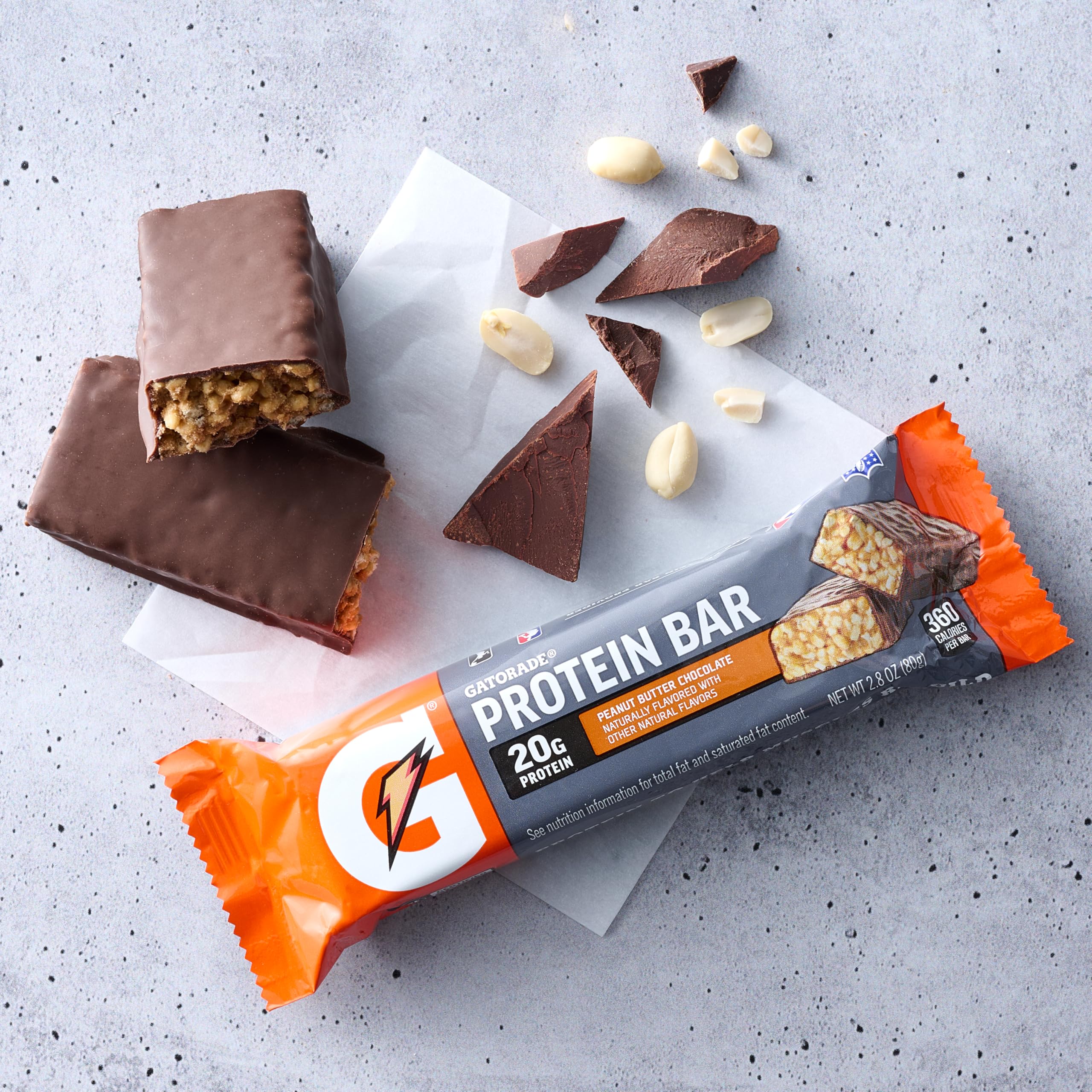 Gatorade recover bar beside a kitchen scale showing 2.8 ounce serving