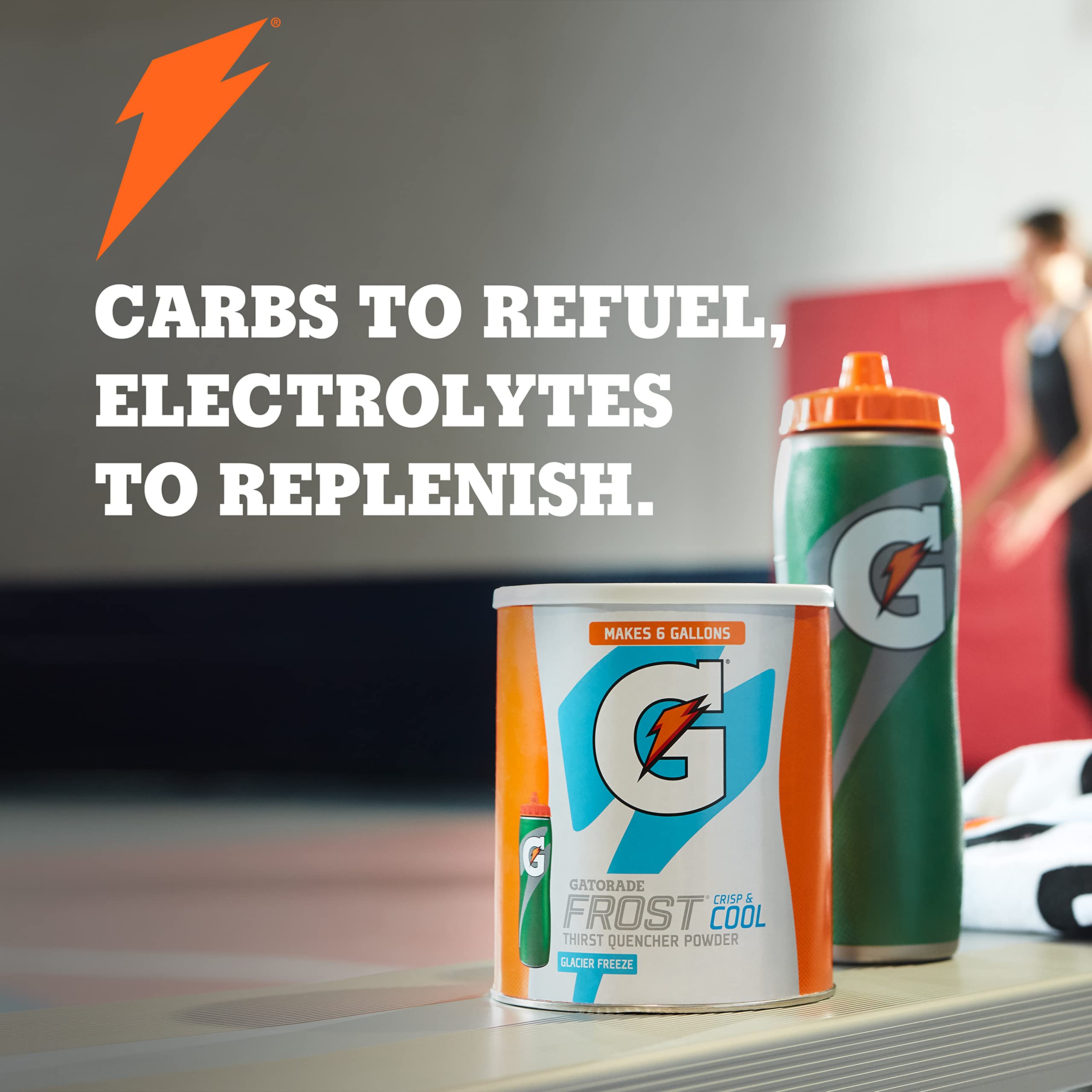Scoop measuring Gatorade powder for accurate mixing and consistency
