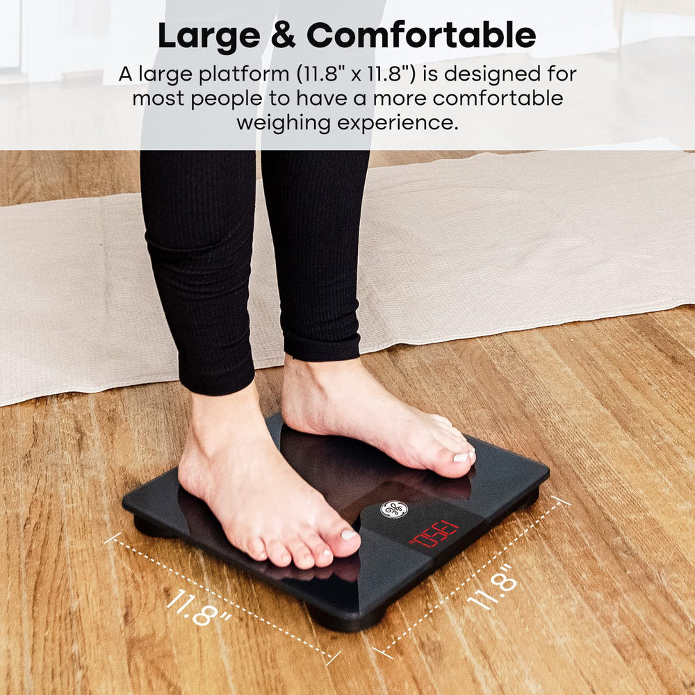 Phone screen with Fit Profile app syncing GE scale data for tracking