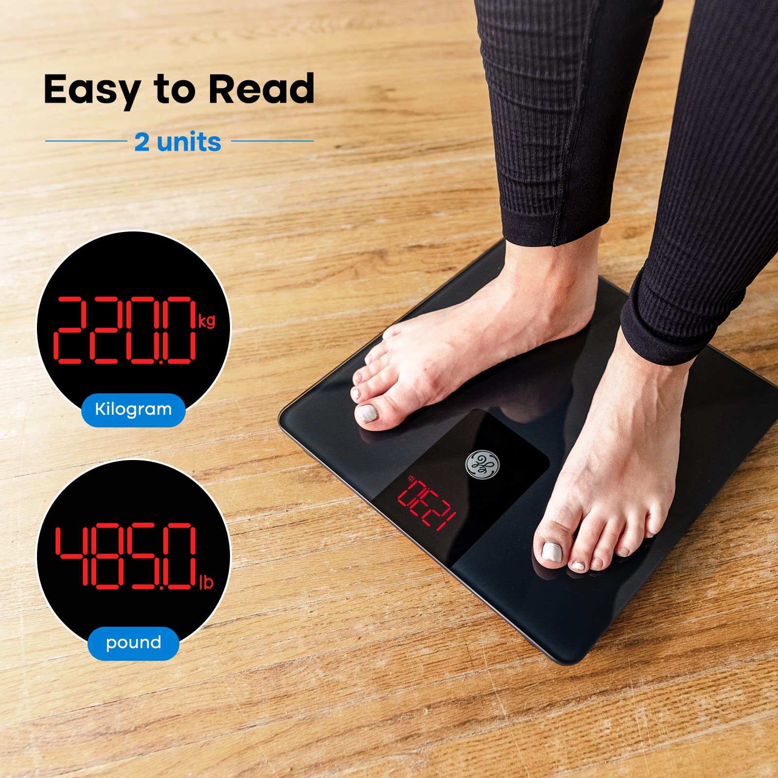 Person using GE scale in bathroom showing user-friendly weighing