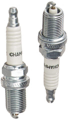 Generac oil filter with angled funnel in hand demonstrating spill‑free oil change
