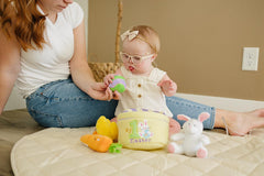 Genius Baby Toys close-up of yellow chick showing squeaker and tactile fun