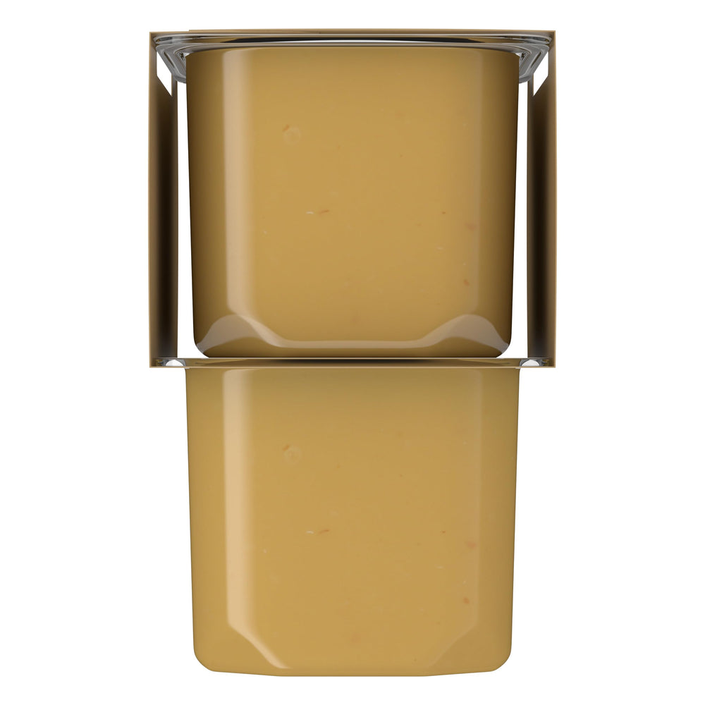 Gerber puree spooned into bowl showing ready-to-serve convenience