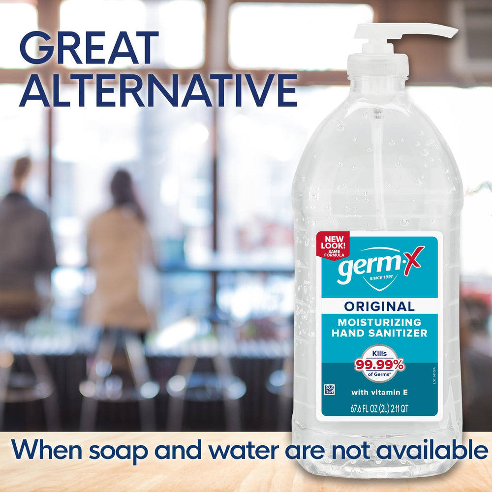 Germ-X dispenser being pumped into hand for fast, convenient use