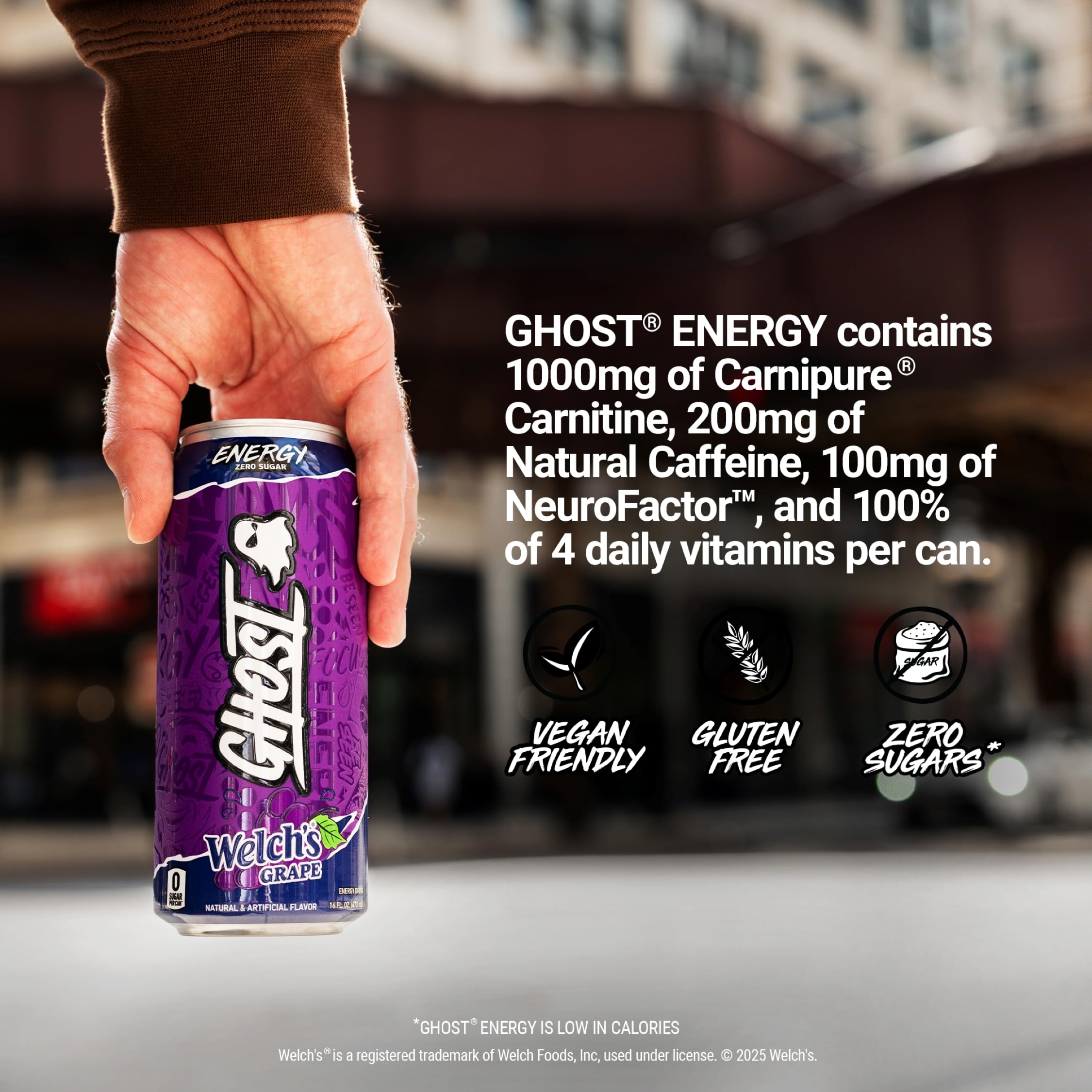 GHOST Welch's Grape 16oz can in hand showing real-world size and convenience