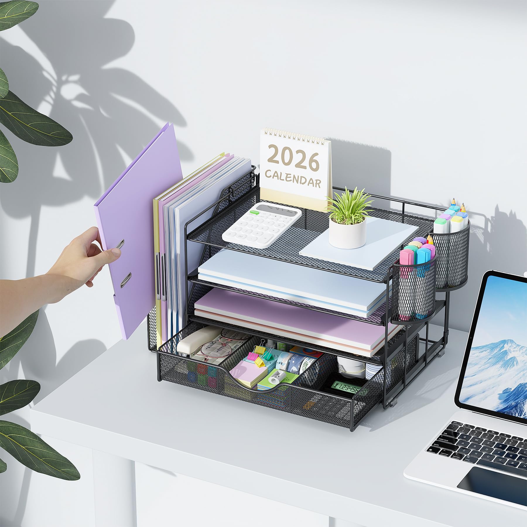 gianotter next to laptop illustrating compact size and scale