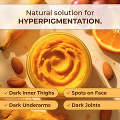 Glo Melanin open jar revealing creamy turmeric scrub texture that moisturizes