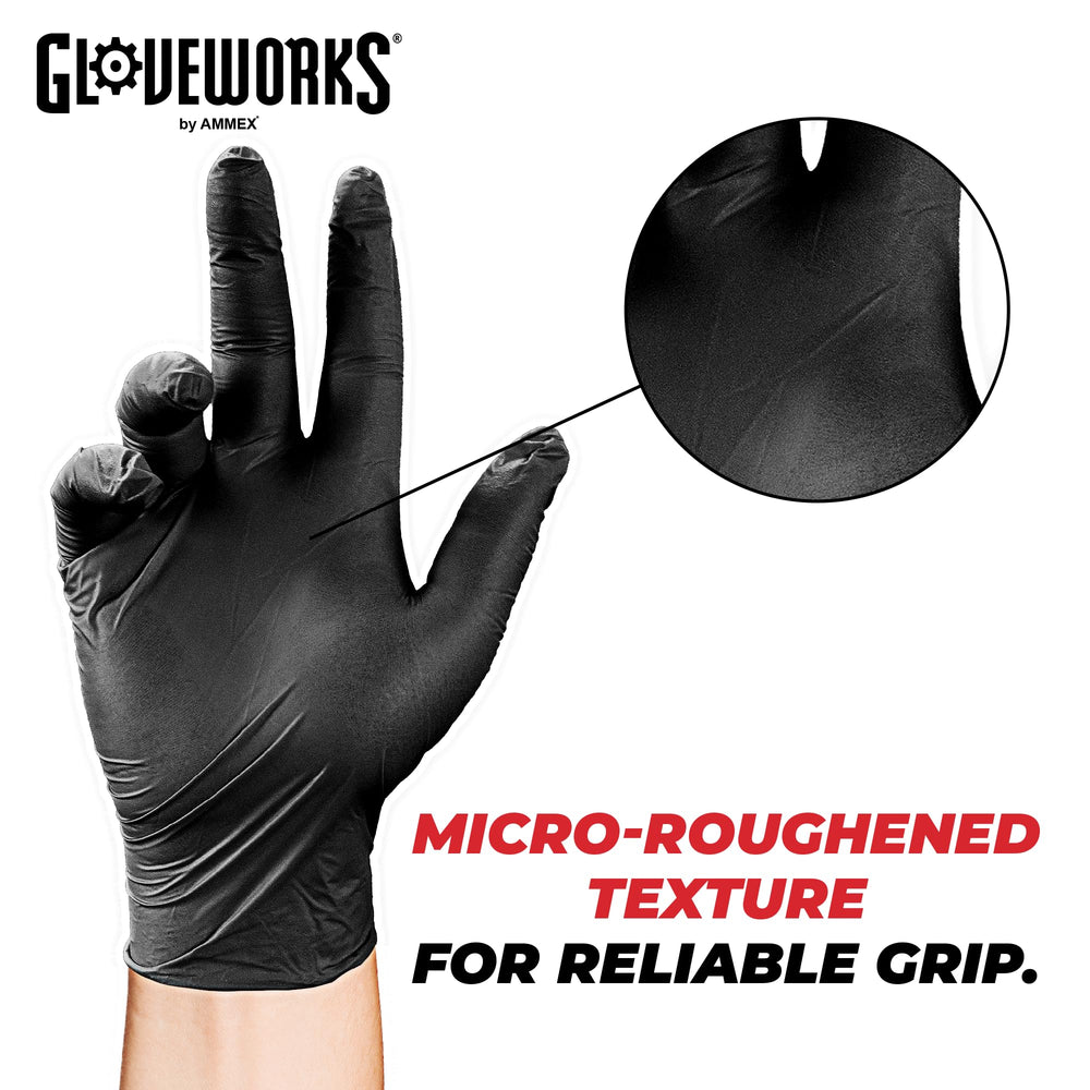 GLOVEWORKS glove on hand holding wrench demonstrating durability and tool grip benefit