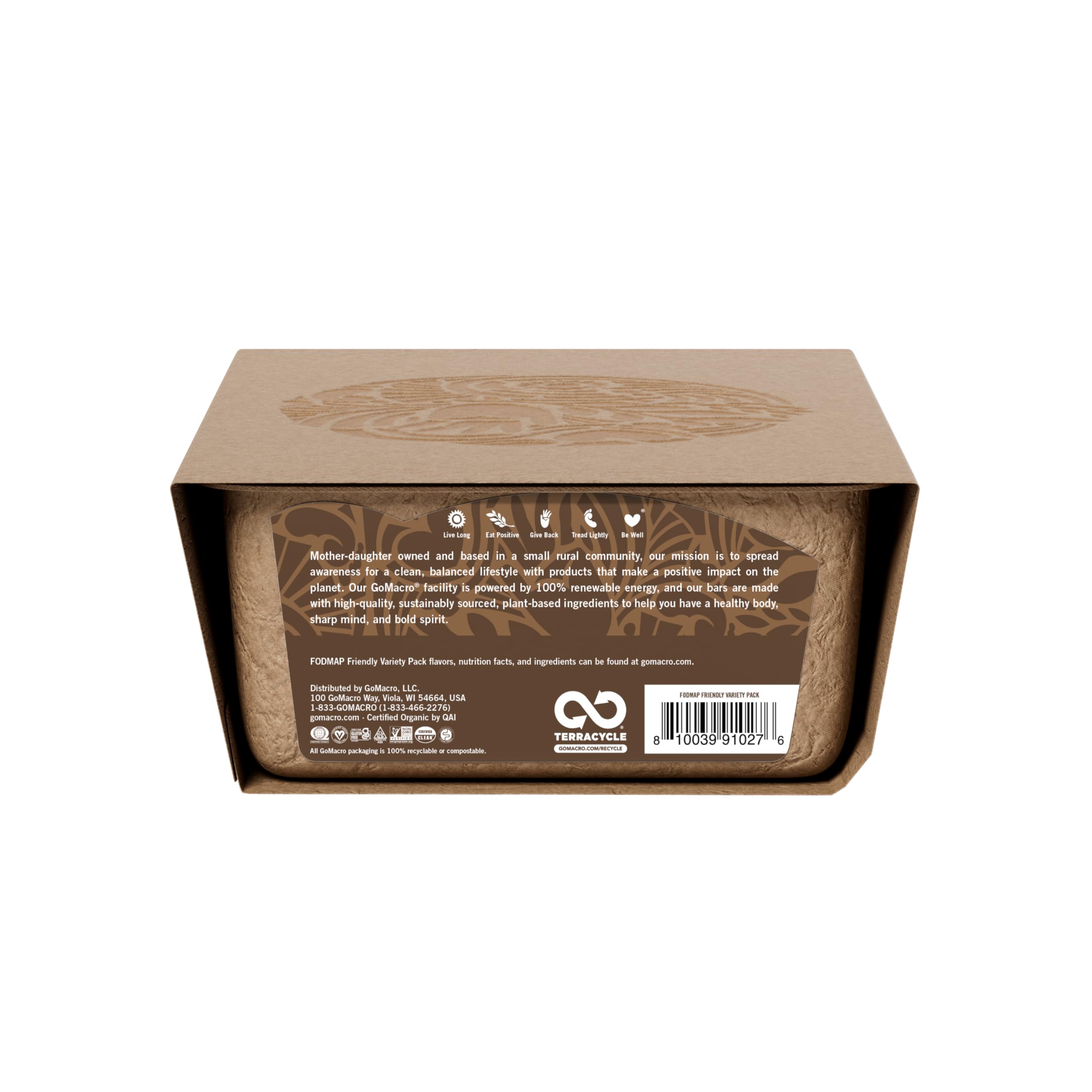 GoMacro MacroBar beside a coffee cup in a kitchen setting illustrating a quick satisfying snack